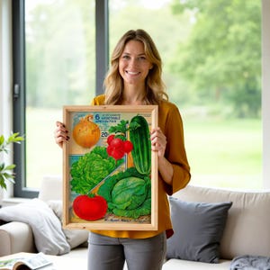 May include: A framed vintage print featuring illustrations of various vegetables, including an onion, tomatoes, lettuce, a cucumber, and cabbage. The print has text that reads "6 of my leading vegetable specialties" and "W. Henry Maule."