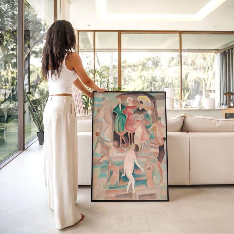 May include: An abstract painting in a black frame. The artwork features figures in various colors, including red, green, and pink, with a muted background. The style appears to be a blend of cubism and expressionism. The painting is held by a person.