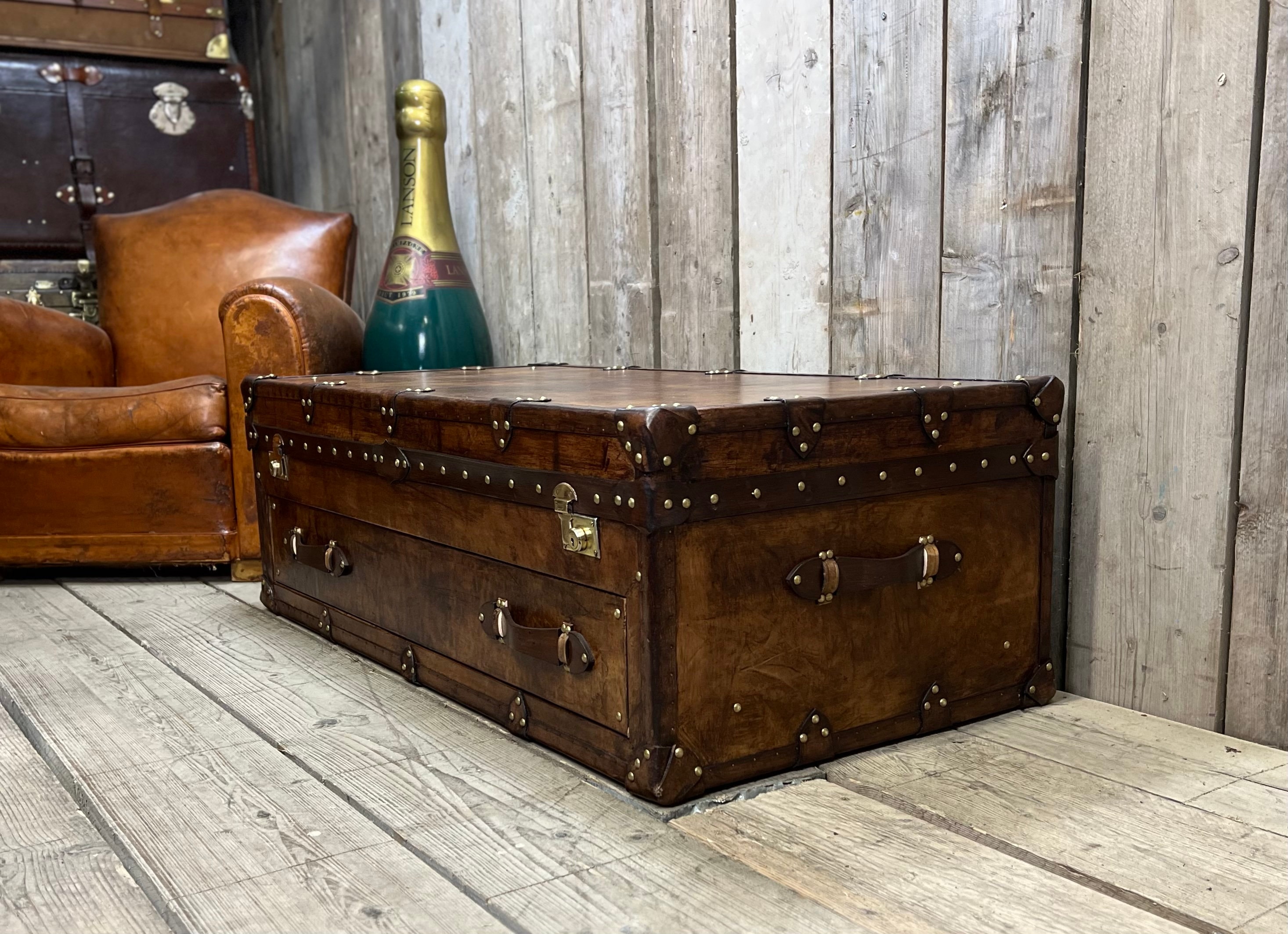 Leather trunk coffee table discount