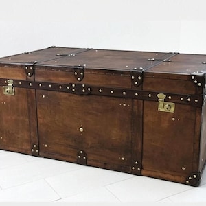 English Artisan Handmade Leather Trunk Vegetable Tan Storage Chest Coffee Table Living Room Furniture Heirloom Quality Brown Chestnut Finish Hand Dyed Unique Character Brass Hardware Accents Large Bedroom Ottoman Wedding Gift Luxury