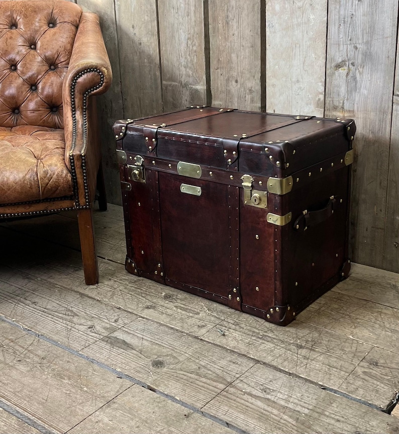 Handcrafted Storage Trunk Leather Chest Campaign Style Furniture Travel Inspired Design Premium Quality Construction English Craftsmanship Hand Dyed Bridle Leather Brass Fittings Console Table Side Furniture Living Room Bedroom Accent