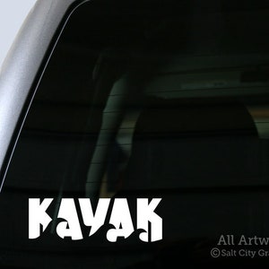 Vinyl decal with the word Kayak shown on truck window