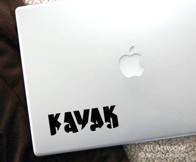 Vinyl decal with the word Kayak shown on laptop