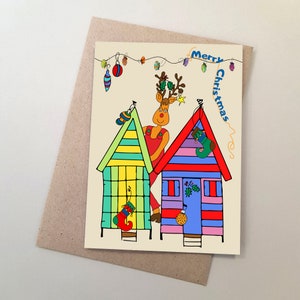 Carte de Noël fantaisiste, Noël à la plage, renne Rudolph et cabines de plage, fait main, illustration dessinée à la main, fabriqué en Australie.