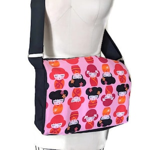 Black and pink Japanese dolls medium messenger bag
