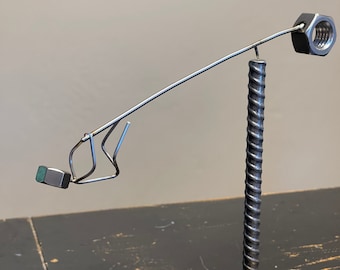 polecat style balance sculpture