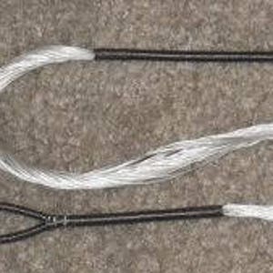 May include: A black and silver bowstring for archery. The string is made of a braided material with a black core and silver outer layer.