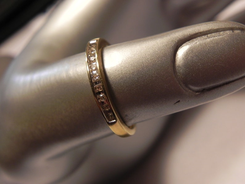 10K Gold Wedding Band with 9 sparkly channel set 2pt Diamonds Size 7.25