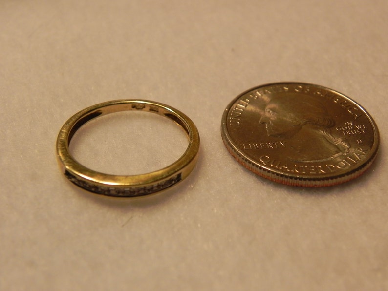 10K Gold Wedding Band with 9 sparkly channel set 2pt Diamonds Size 7.25