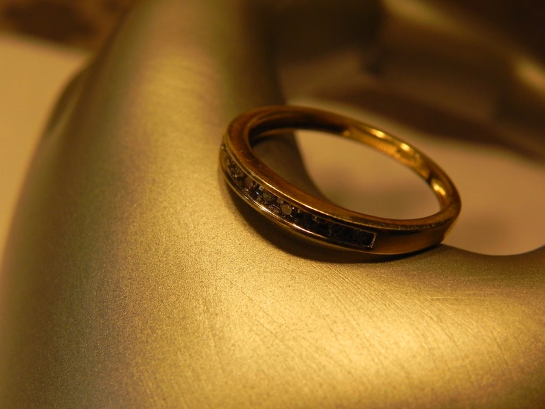 10K Gold Wedding Band with 9 sparkly channel set 2pt Diamonds Size 7.25
