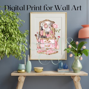 May include: A digital print of a watercolor illustration of a pink vanity with gold accents and makeup brushes, bottles, and a compact mirror. The vanity is surrounded by pink roses.