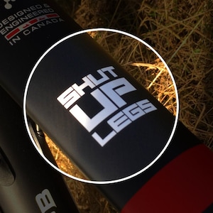 SHUT UP LEGS! Jens Voight Motivational Bike Top Tube or Stem Sticker (001).