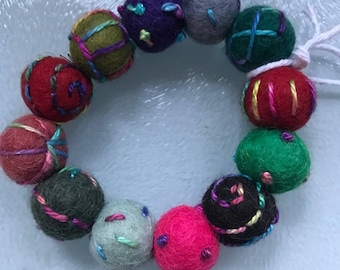 Embroidered wool felt bead bracelet