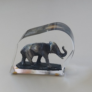 Glass Enclosed Metal Elephant