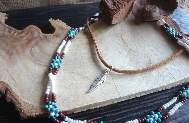 Beautiful tan faux suede cord choker with feather charm pendant 12-15