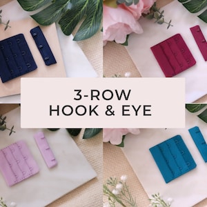 May include: A collection of 3-row hook and eye closures in navy blue, burgundy, lavender, and teal. Each set includes a hook and eye piece. The text "3-ROW HOOK & EYE" is displayed in the center of the image.