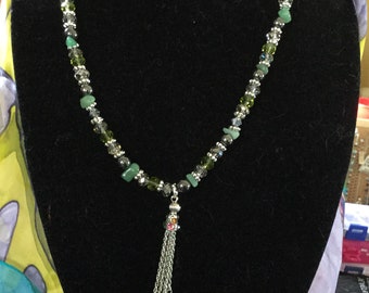 Necklace with beautiful bead work!  Howlite, marcasite, Czech glass and Swarovski crystals adorned with a beautiful beaded tassel!