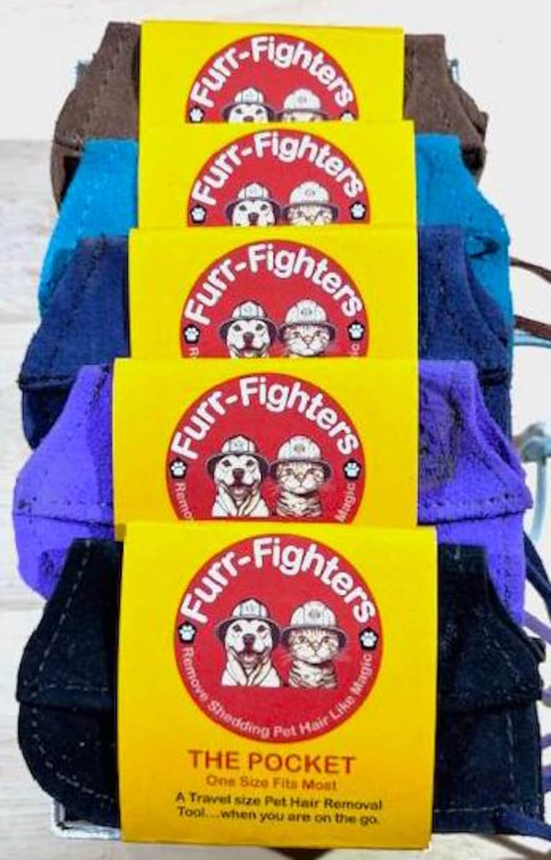 May include: A stack of five yellow and red Furr-Fighters pet hair removal tools. Each tool features a cartoon dog and cat wearing firefighter helmets. The text "Furr-Fighters" is written in a bold, black font around the cartoon animals. The bottom tool has the text "The Pocket" and "One Size Fits Most" written in black font. The text "A Travel size Pet Hair Removal Tool...when you are on the go." is written in black font.