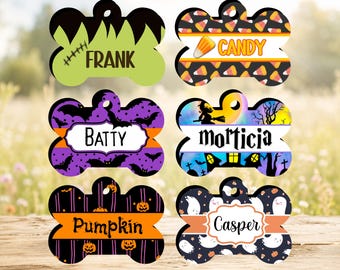 May include: Six bone-shaped pet ID tags with Halloween themes. Top left: green with Frank text. Top right: candy corn pattern with Candy text. Middle left: purple bats with Batty text. Middle right: witch and house with Morticia text. Bottom left: pumpkins with Pumpkin text. Bottom right: ghosts with Casper text.