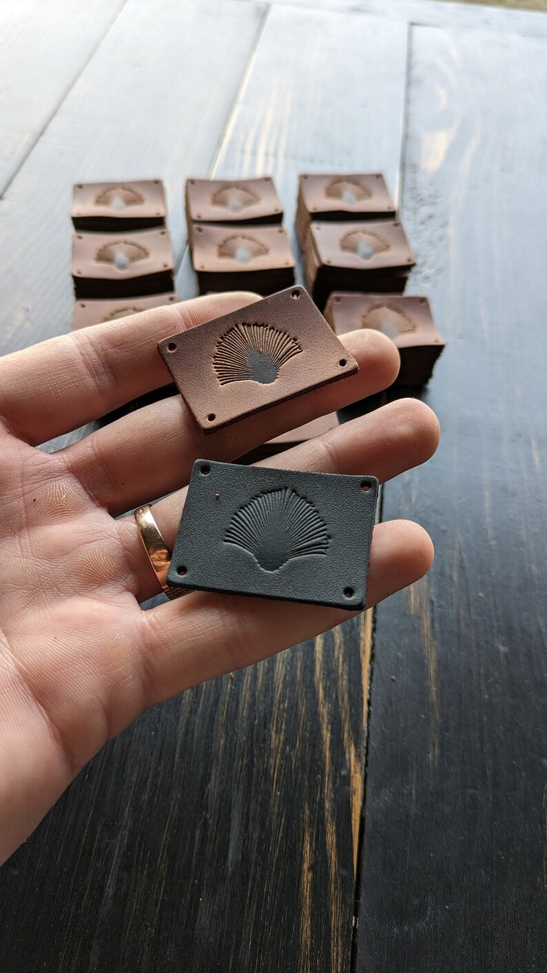 Leather tags. Custom engraved tags. Labels for sewing. labels for knitting. Jewelry tags. Tags for knitting. Handmade tags. Sewing tags. Customized sewing tags. Customized knitting tags. Ecoleather tags. Vegan leather tags for knitting and sewing.