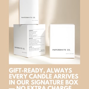 May include: Three white rectangular candle boxes with black text. The front of each box displays the brand name PAPERWHITE CO. and BOUGIE PARFUMEE. One box shows detailed ingredients, directions, and caution text, with a net weight of 227g 8 oz.
