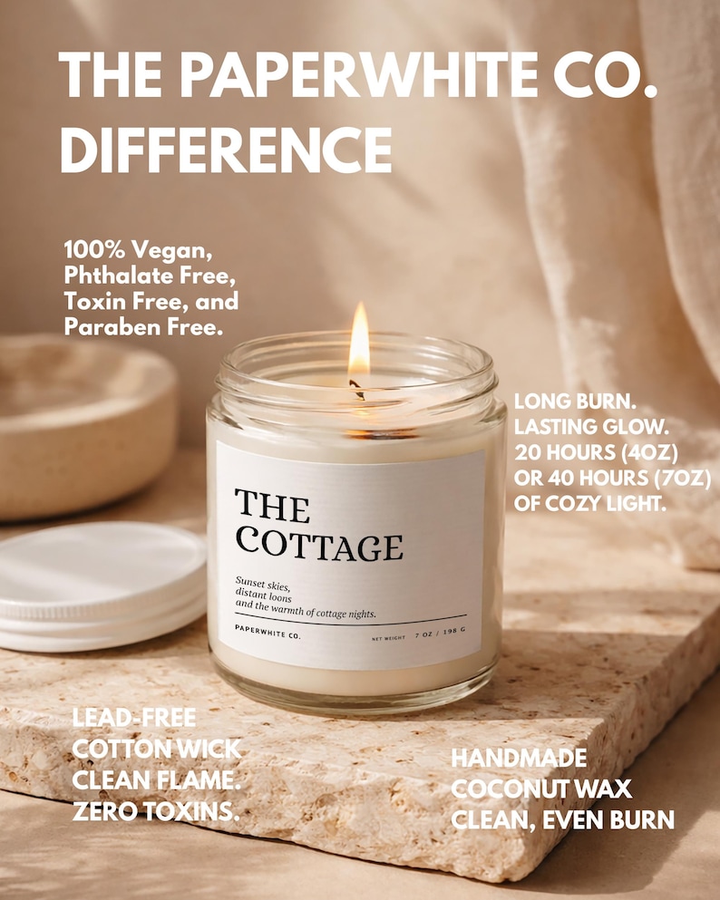 May include: A lit candle in a clear glass jar with a white label that reads "THE COTTAGE." The candle is on a stone surface. Text on the image includes "100% Vegan" and "Handmade Coconut Wax."