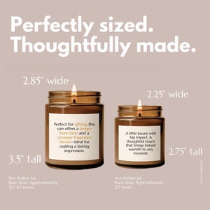 May include: Two amber glass jar candles with white labels and lit wicks. The larger candle is 2.85 inches wide and 3.5 inches tall, while the smaller candle is 2.25 inches wide and 2.75 inches tall. Text on labels includes descriptions of burn times.