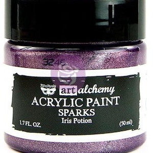 May include: A jar of Finnabair Art Alchemy Sparks acrylic paint in the colour Iris Potion. The jar has a black screw-top lid and a label with white text reading Art Alchemy, Acrylic Paint, Sparks, Iris Potion, 1.7 fl. oz., and 50 ml.