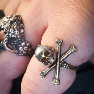 Adjustable pirate Cross Bone skull ring.