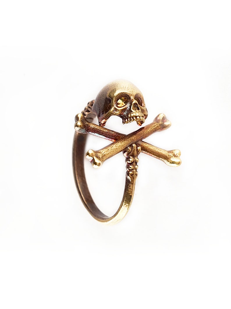Adjustable pirate Cross Bone skull ring.