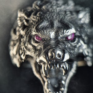 Savage looking wolf in 925 sterling silver with ruby as eyes