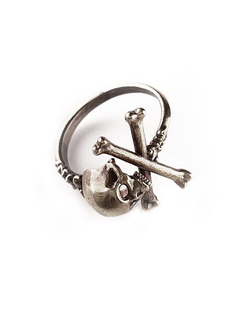 Adjustable pirate Cross Bone skull ring.