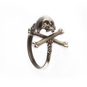 Adjustable pirate Cross Bone skull ring.