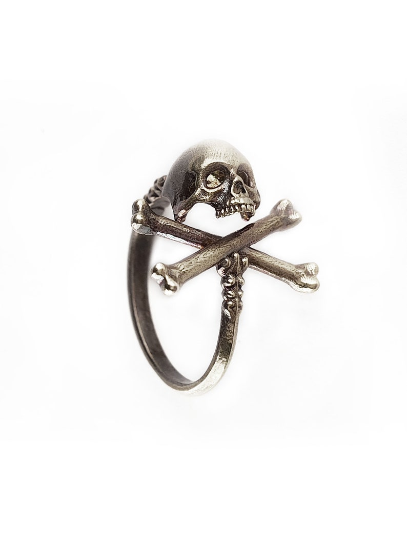 Adjustable pirate Cross Bone skull ring.