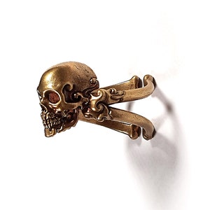 Decorative adjustable Cross bone skull Ring.