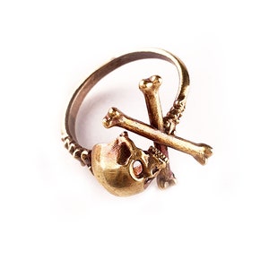 Adjustable pirate Cross Bone skull ring.