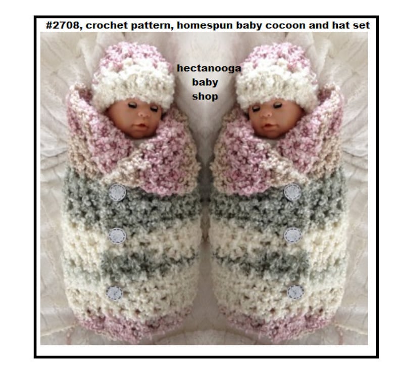 May include: A crochet pattern for a baby cocoon and hat set. The set is made in a homespun style with pink, white, and grey yarn. The cocoon has buttons down the front and the hat has a fluffy pom-pom on top.