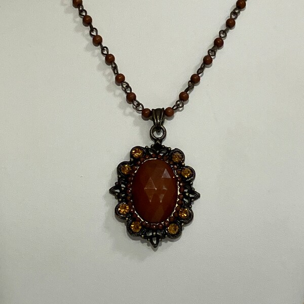 Victorian Style Vintage Brown Amber Faceted Glass Pendant With Filigree and Rhinestone Frame; Brass Tone Pendant on Beaded 17 Inch Chain