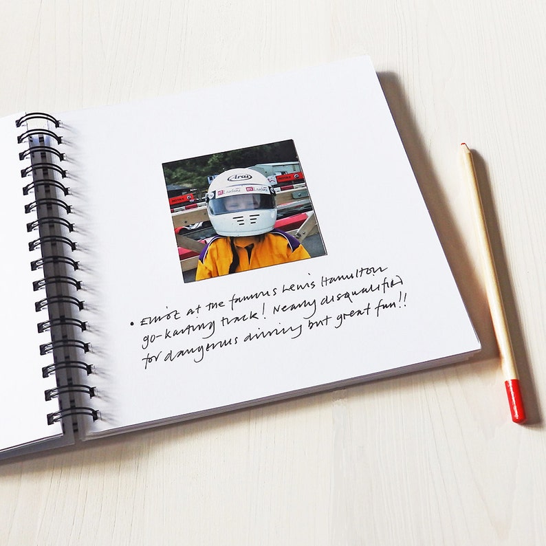 May include: A photo of a young person wearing a racing helmet and yellow racing suit. The photo is in a scrapbook with the caption: "Emist at the famous Lewis Hamilton go-karting track! Nearly disqualified for dangerous driving but great fun!!"