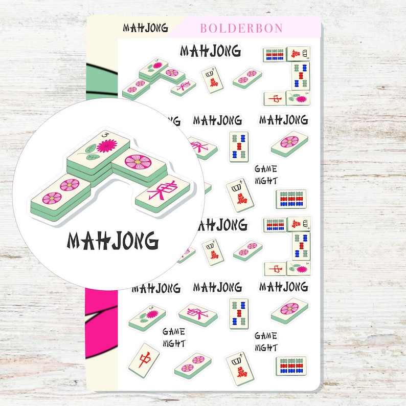May include: A sheet of colourful stickers featuring illustrations of mahjong tiles. The stickers are designed for use in a planner or journal. The stickers feature the words "Mahjong" and "Game Night".