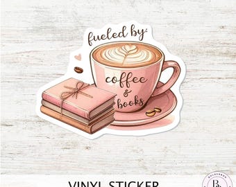 May include: A vinyl sticker featuring a pink coffee cup with latte art, the words "coffee & books," and a stack of books tied with twine. The phrase "fueled by" is above the coffee cup. The sticker is on a white wood-grain background.