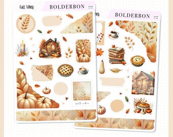 May include: Fall-themed journal kit with stickers featuring pumpkins, leaves, a cabin, books, and a pie. The kit includes the text "Fall Vibes" and "Bolderbon".