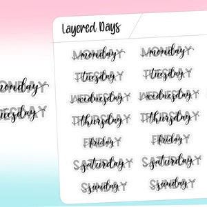 May include: A sticker sheet titled Layered Days featuring multiple rows of individual day-of-the-week labels. Each label displays the day name in a black cursive script layered over a light gray block-letter version of the same day name.