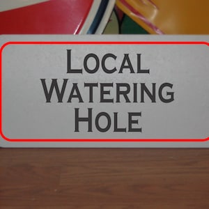Local Watering Hole Metal Sign