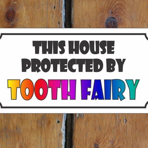This House Protected by The Tooth Fairy Metal Sign