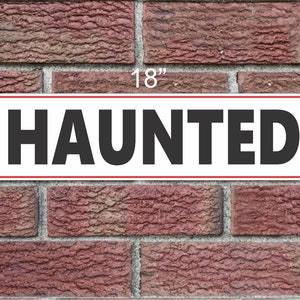HAUNTED Metal Sign 6x18