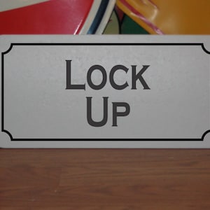 County Lock Up Metal sign