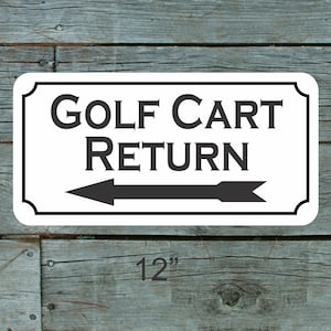 Golfkarretour pijl naar links metalen bord voor golfbaan driving range Pro Shop