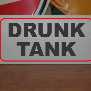 DRUNK TANK Metal sign