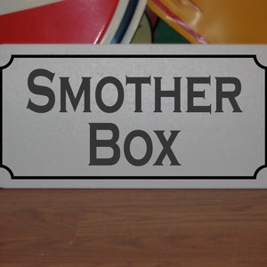 Smother Box Metal Sign